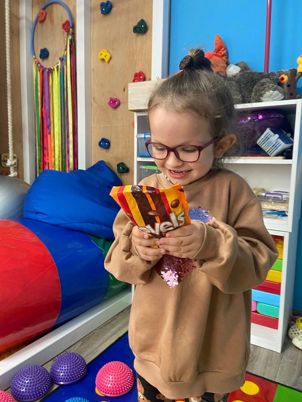 Little girl so happy to receive UK chocolates